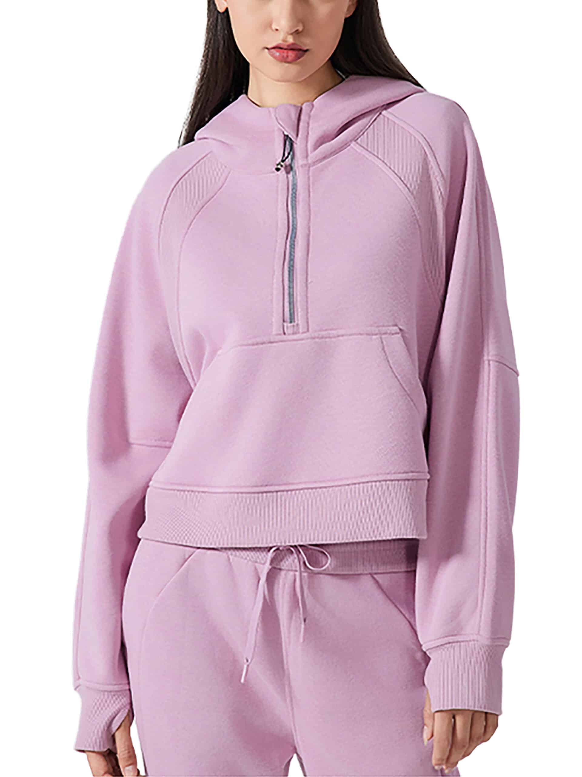 Stylish pink women's hoodie with zip-up front and comfortable fit.